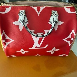 LOUIS VUITTON
Monogram Giant Speedy Bandouliere 30 Rouge